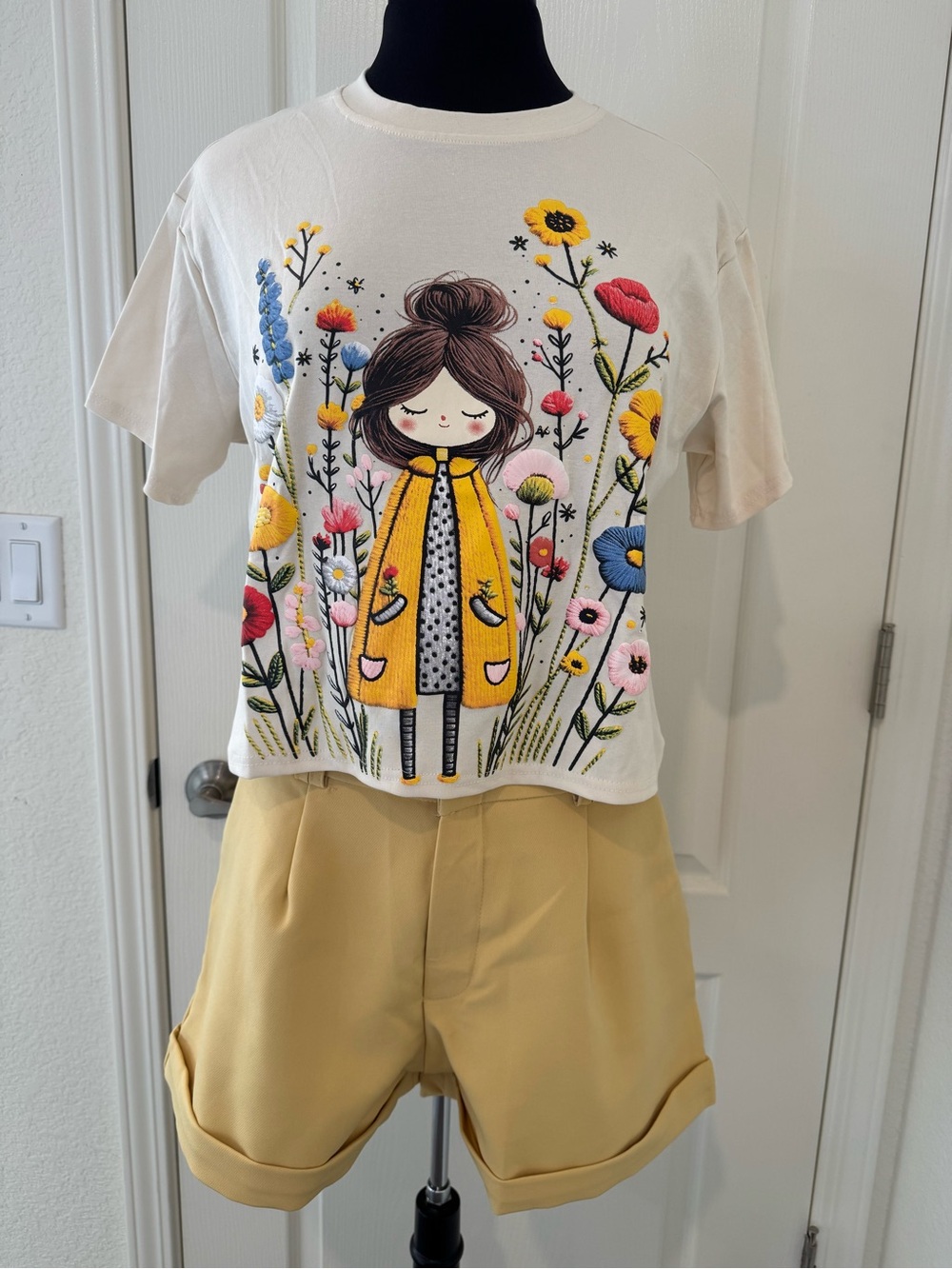 White Graphic Crop Tee with Yellow Floral Girl and Yellow Shorts